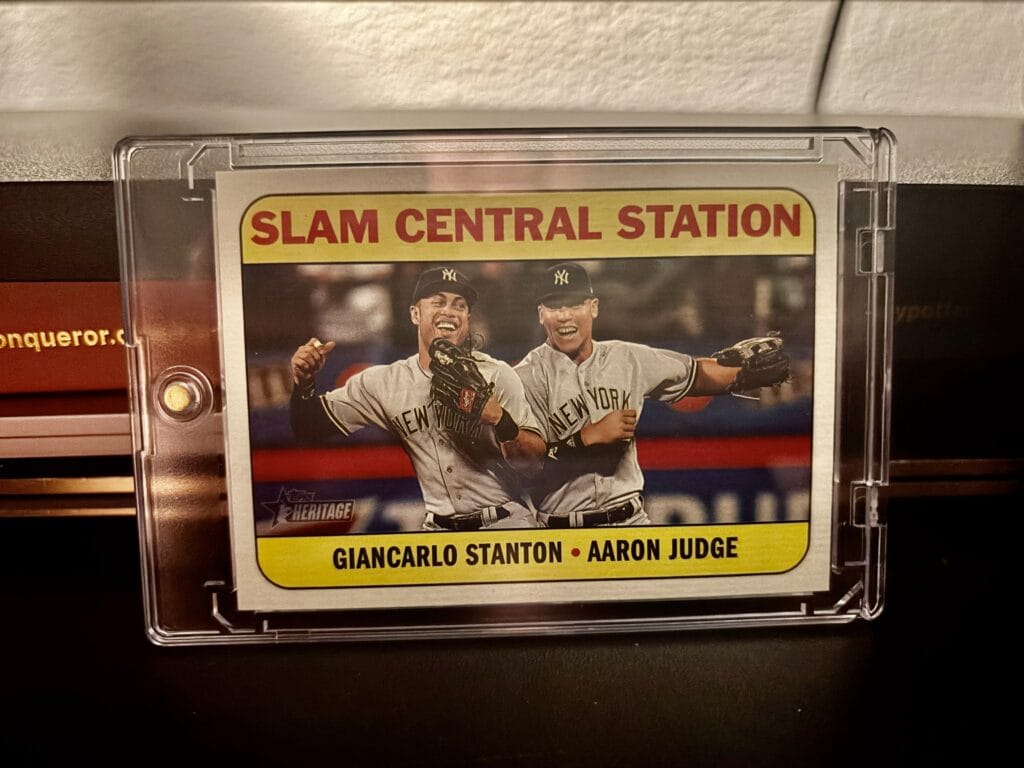 Photo of one of Dr. El's favorite cards featuring Giancarlo Stanton & Aaron Judge Celeberating a Yankees Win